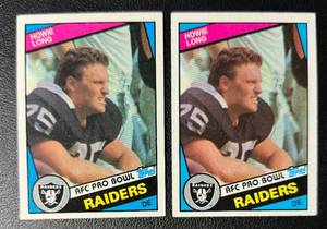lot 165 image: 2 Howie Long RCs 1984 Topps #111 Rookie Football Cards