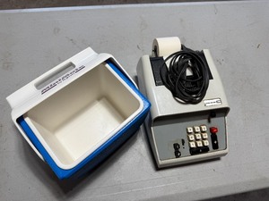 lot 43 image: CALCULATOR AND LUCH BOX.