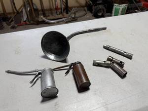 lot 12 image: OILING CANS, FUNNEL AND SPARK PLUG SOCKETS