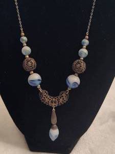 lot 73 image: Silver Filagree Blue & White Swirl Art Glass Beaded Necklace