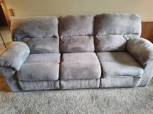 lot 298 image: Plush Gray Wall Hugger Electric Reclining Couch