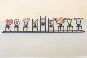 lot 172 image: Whimsical Chair Menorah  Hannukiah