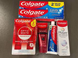 lot 12 image: Colgate Toothpaste Bundle Including Optic White, Cavity Protection, and Plaque Pro Release