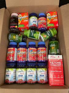 lot 32 image: Large Lot of Dietary Supplements and Vitamins Including Flintstones, TruBiotics, and GNC
