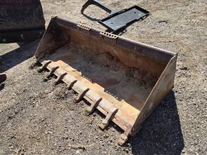 lot 6 image: Bobcat Skid Steer Loader Bucket Attachment with Teeth approximately 72 inches wide