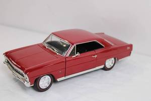 lot 10 image: Die-Cast 1966 Chevy Nova Super Sport Model Car Red 118 Scale