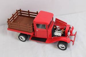 lot 48 image: Die-Cast Red Vintage Pickup Truck Model with Opening Hood