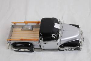 lot 52 image: Diecast 1951 Chevrolet Pickup Truck Model with Black and Silver Finish
