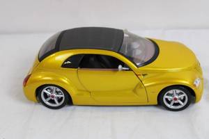 lot 57 image: Maisto 118 Scale Chrysler Pronto Cruizer Diecast Model Car