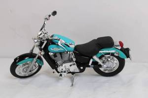 lot 93 image: Die-Cast Harley-Davidson Motorcycle Model in Teal and Black