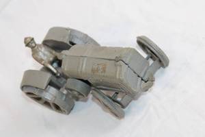 lot 111 image: Vintage Cast Iron Toy Tractor with Driver