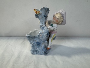 lot 147 image: Antique Porcelain Boy Figurine Tree Stump Posy Vase