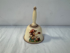 lot 155 image: 1979 Goebel M.I. Hummel Porcelain Bell with Girl and Bird Motif