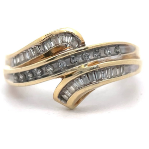 lot 32 image: 0.25 Carat Natural Diamond Channel Wave Bypass Ring in Yellow Gold VIDEO