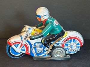 lot 47 image: Vintage Tin Wind-Up Motorcycle Toy with Rider