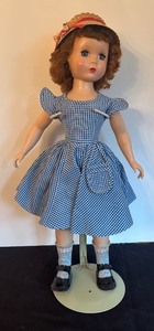 lot 52 image: Vintage Madame Alexander Maggie Walker Doll with Hat and Dress