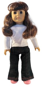 lot 64 image: American Girl 18-Inch Doll with Brown Hair, White Top, and Jeans