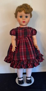 lot 99 image: Vintage Doll with Plaid Dress and Black Shoes