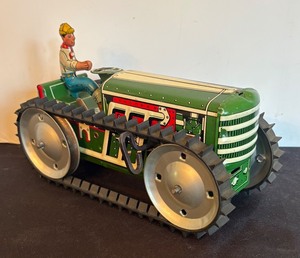 lot 151 image: Vintage Wind Up Tin Tractor Toy with Driver