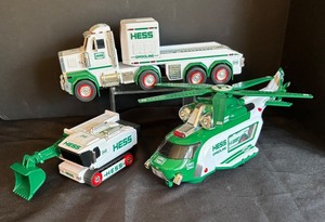 lot 164 image: Hess Toy Truck, Helicopter, and Bulldozer Set