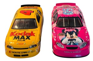 lot 77 image: Set of 2 Monte Carlo Diecast NASCAR Cars Kodak and Minnie Daytona 500