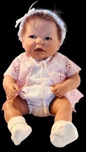 lot 123 image: Vintage 16.5-Inch Berenguer Baby Doll by JC Toys Group