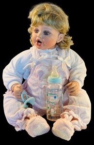 lot 127 image: 27-Inch Fayzah Spanos Design Vintage Baby Doll with Accessories