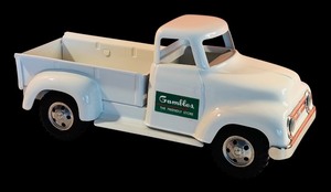 lot 128 image: Gambles The Friendly Store White Pickup Truck Model
