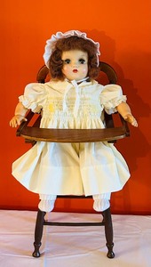 lot 455 image: Vintage 1949 Horsman Composition Cray Baby Doll in High Chair