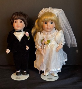 lot 250 image: Maryan Yu Designs Bride and Groom Dolls