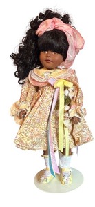 lot 365 image: Madame Alexander Doll with Curly Hair and Floral Dress