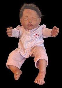 lot 405 image: New Born Style Baby Doll with  Pink Outfit