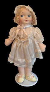 lot 408 image: Vintage Cloth Doll with Blonde Braids and Lace Dress