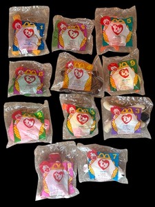 lot 448 image: Set of 11 McDonalds Ty Beanie Babies Plush Toys Sealed including Goldie, Speedy, Pinky, Quacks and More