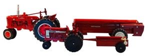 lot 481 image: Vintage Farmall Pressed Steel Tractor and Trailer Set