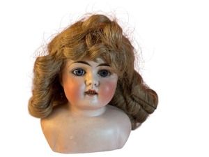lot 61 image: Antique Bisque Doll Head with Blonde Curly Hair and Blue Eyes