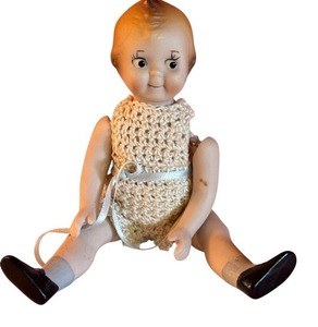 lot 34D image: 6-Inch 1981 Bisque Kewpie Doll with Crochet Outfit