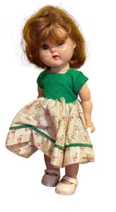 lot 387 image: Vintage Ginny Vogue Doll in Green Floral Dress