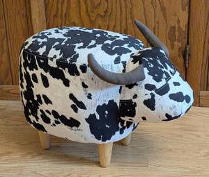 lot 26 image: Adorable Black and White Cow Ottoman