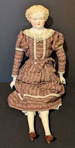 lot 646 image: Porcelain Head and Feet Doll