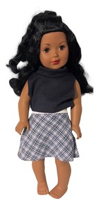 lot 728R image: LL - 2009 Alexander Doll Company Doll with Black Hair and Plaid Skirt