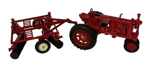 lot 809R image: 11 - Farmall F-20 Diecast Tractor with Implement - Approx. 17 Inches Long