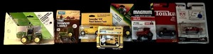 lot 708H image: LR - Collection of 8 Vintage Die-Cast Cars and Tractors in Original Packaging