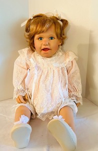 lot 613C image: LR - Jessica Simon Porcelain Doll with Lace Dress and Blonde Hair