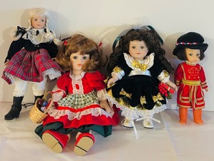 lot 628C image: LR - Set of 4 Porcelain Collector Dolls with Original Outfits, Tallest 10 Inches