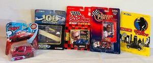 lot 721C image: LR - Collection of 5 Sealed Die Cast Collectible Cars and Plane Assortment
