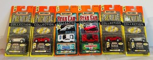 lot 727C image: LR - Set of 6 Matchbox Premiere Collection and Star Car Diecast Vehicles, Factory-Sealed