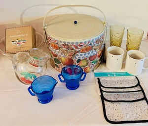 lot 761C image: LR - Kitchenware Collection Vintage Pie Carrier, Blue Glass Creamer & Sugar, Amber Glasses, Novelty Mugs, Pitcher, and Accessories