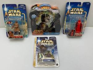 lot 8 image: Misc. STAR WARS Collectible Action Figures And More (NIP)