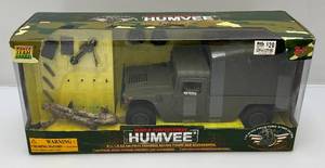 lot 9 image: World Peacekeepers HUMVEE Action Set (NEW Loose Parts In Box)